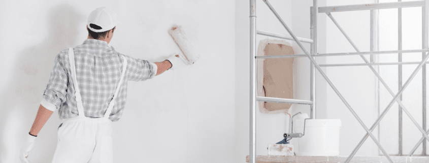 Skilled painters working on interior painting project with meticulous attention to detail at Ponderosa Painting's Interior Painting Services.